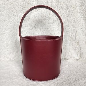 STAUD Bissett Bucket Bag with Strap in Deep Red